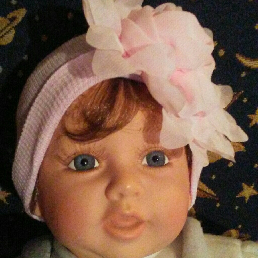 Pink silky flower baby/toddler hat